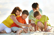 Family on sand