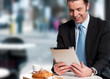 Handsome manager reviewing business updates