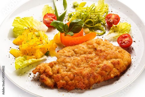 Photo: Fried pork chop and vegetable salad Fried pork chop and vegetable salad