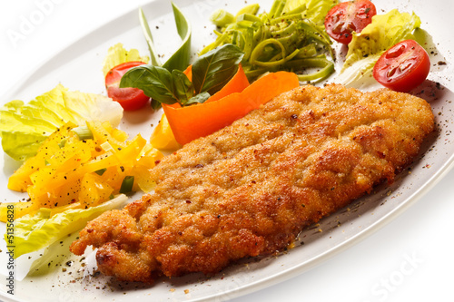Photo: Fried pork chop and vegetable salad Fried pork chop and vegetable salad