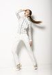 Clothing Design. Modish Woman in White Blouse and Pants. Fashion