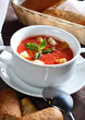 Delicious cold Gazpacho soup in white bowl