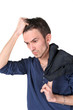 Portrait of  thinking young man