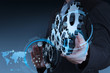 businessman hand working with coggear to success