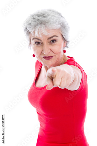 Photo: Powerfrau in Rot isoliert mit grauen Haaren Powerfrau in Rot isoliert mit grauen Haaren
