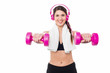 Photo: Woman enjoying music while doing dumbbells Woman enjoying music while doing dumbbells