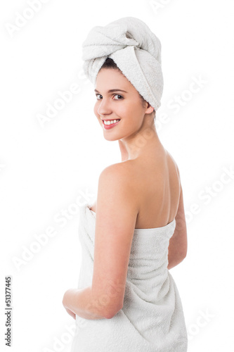 Photo: Spa woman turning back and smiling Spa woman turning back and smiling