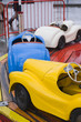 Colorful toy cars at attraction
