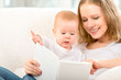 Mother Reading A Book A Little...