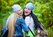 Happy friends during vacation in park