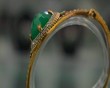 Women's jewelry bracelet with green stone 2. Medium shot
