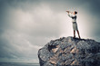 Business woman with telescope