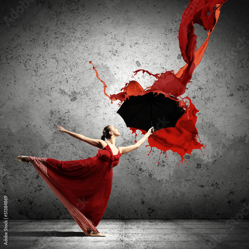 Photo: Ballet dancer in flying satin dress with umbrella Ballet dancer in flying satin dress with umbrella