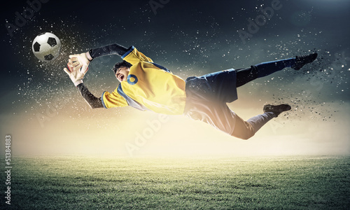 Photo: Goalkeeper catches the ball Goalkeeper catches the ball