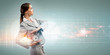 Foto: Business woman holding alarmclock Business woman holding alarmclock