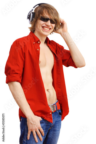 Photo: Happy smiling young man dancing Happy smiling young man dancing