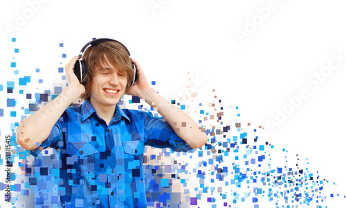 Photo: Happy smiling young man dancing Happy smiling young man dancing
