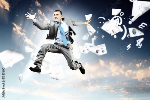 Photo: Image of jumping businessman Image of jumping businessman