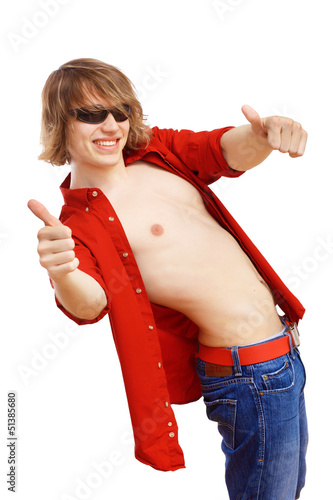 Photo: Happy smiling young man dancing Happy smiling young man dancing