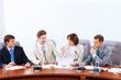Four businesspeople at meeting