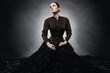 Beautiful fashionable woman in gothic style