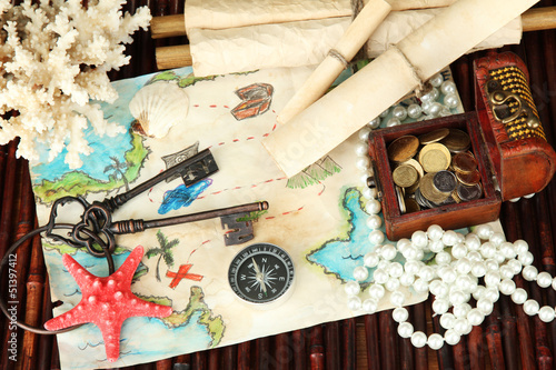 Photo: map of treasures on dark wooden background map of treasures on dark wooden background