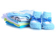 Pile of baby clothes isolated on white