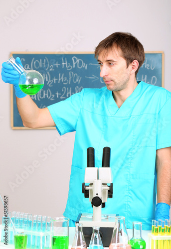 Photo: Assayer during research on room background Assayer during research on room background