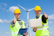 Technician Engineers Thumbs Up with Wind Power Generator