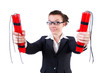 Businesswoman with dynamite on white