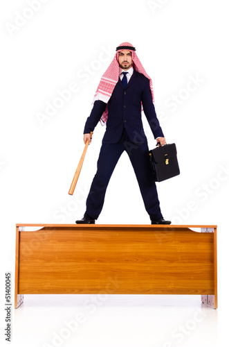 Photo: Arab businessman hitting with baseball bat Arab businessman hitting with baseball bat