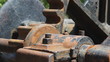 Rusty gears turning. Two shots.