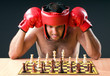 Boxer stuggling with chess game