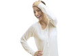 Photo: Young woman looking surprised against white background Young woman looking surprised against white background
