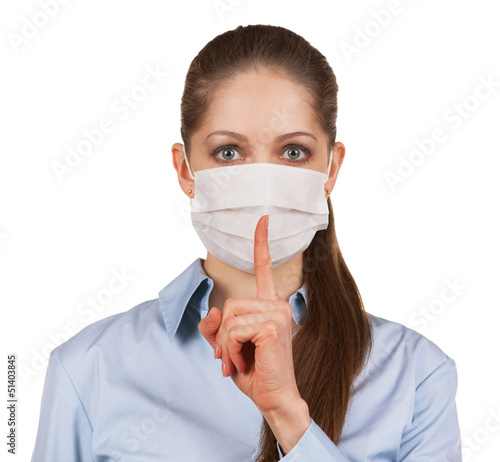 Photo: Woman in protective medical mask Woman in protective medical mask