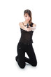 Young and beautiful woman with a gun