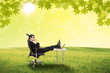 Businessman contemplating in the park