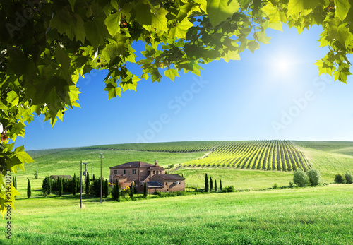 Photo: Tuscany landscape with typical farm house Tuscany landscape with typical farm house