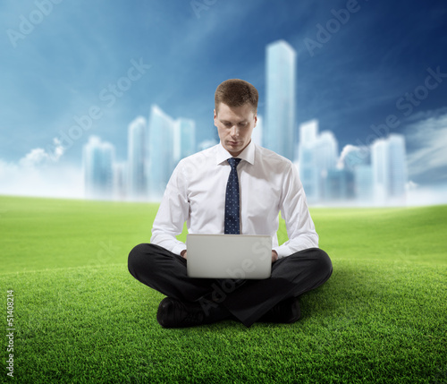 Photo: business man working in park business man working in park