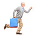 Full length portrait of a smiling gentleman running with shoppin