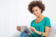 Photo: African Woman Using Digital Tablet African Woman Using Digital Tablet