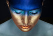 Woman with golden face