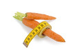 Foto: Frische Möhren mit Massband Frische Möhren mit Massband
