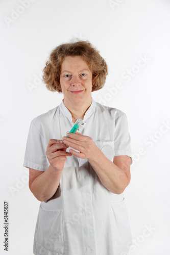 Photo: ältere Krankenschwester ältere Krankenschwester