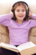 Photo: little girl enjoys music little girl enjoys music