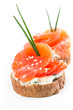 Canapes with salmon and onion