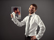 man laughing at a joke