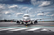 Total View Airplane on Airfield with dramatic Sky
