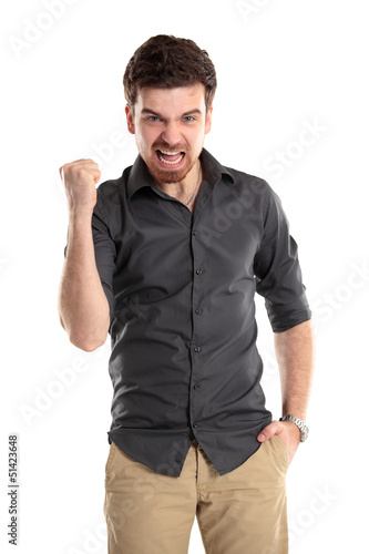 Photo: Excited handsome business man with arms raised in success Excited handsome business man with arms raised in success