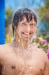 Photo: Man in the outdoor shower Man in the outdoor shower